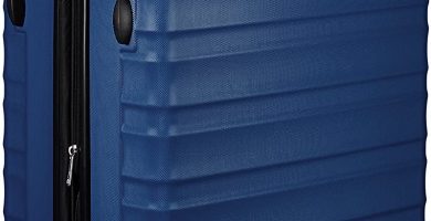 AmazonBasics - Maleta de viaje rígidaa giratoria - 78 cm, grande, Azul marino