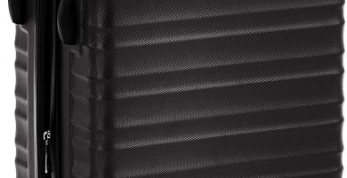AmazonBasics - Maleta rígida giratoria prémium de 55 cm, negra